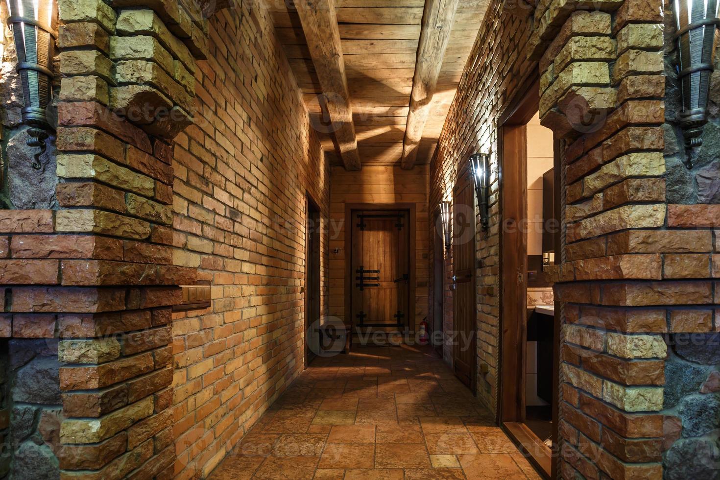 brick wall in interior entrance corridor of vacation house photo