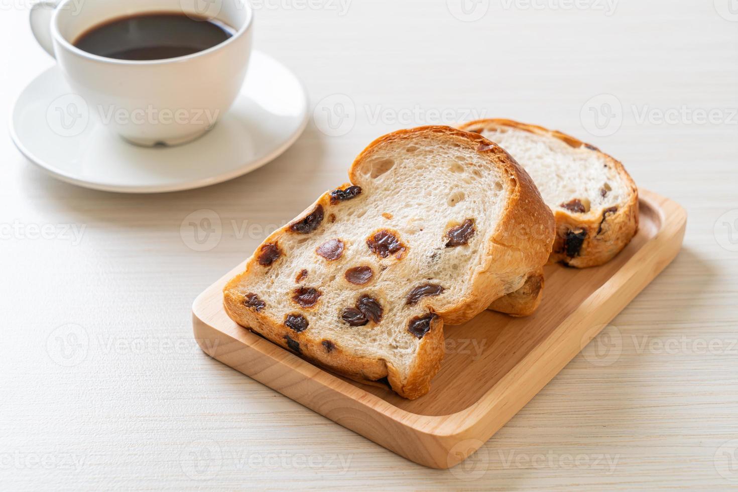 raisin bread with coffee cup photo