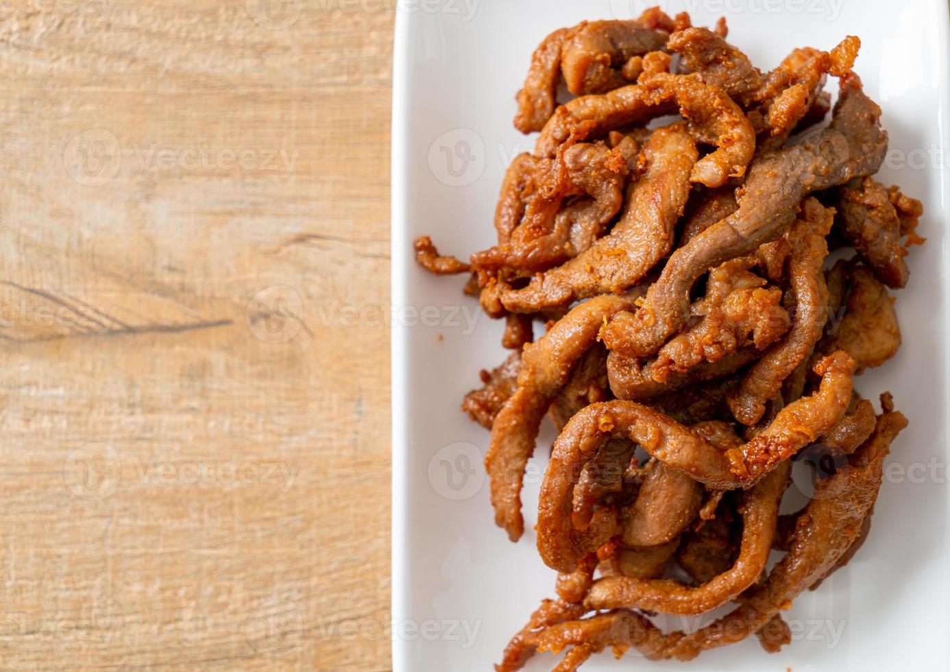 Sun-Dried Pork on white plate photo