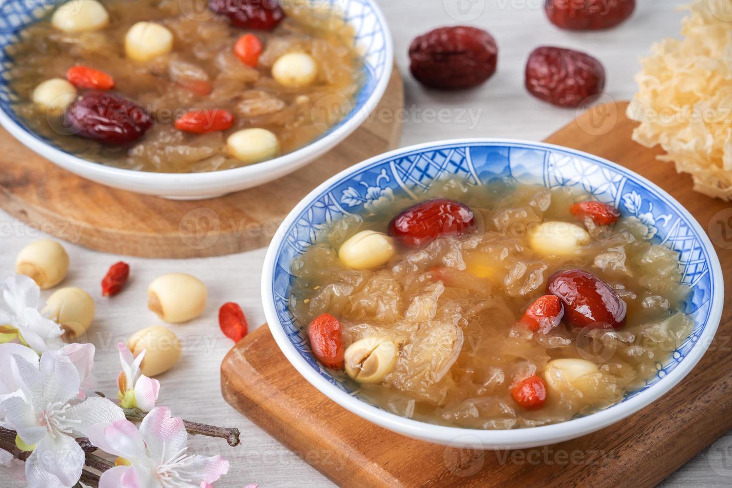 Close up of sweet snow white fungus soup with lotus seed, Chinese red dates and wolfberry. photo