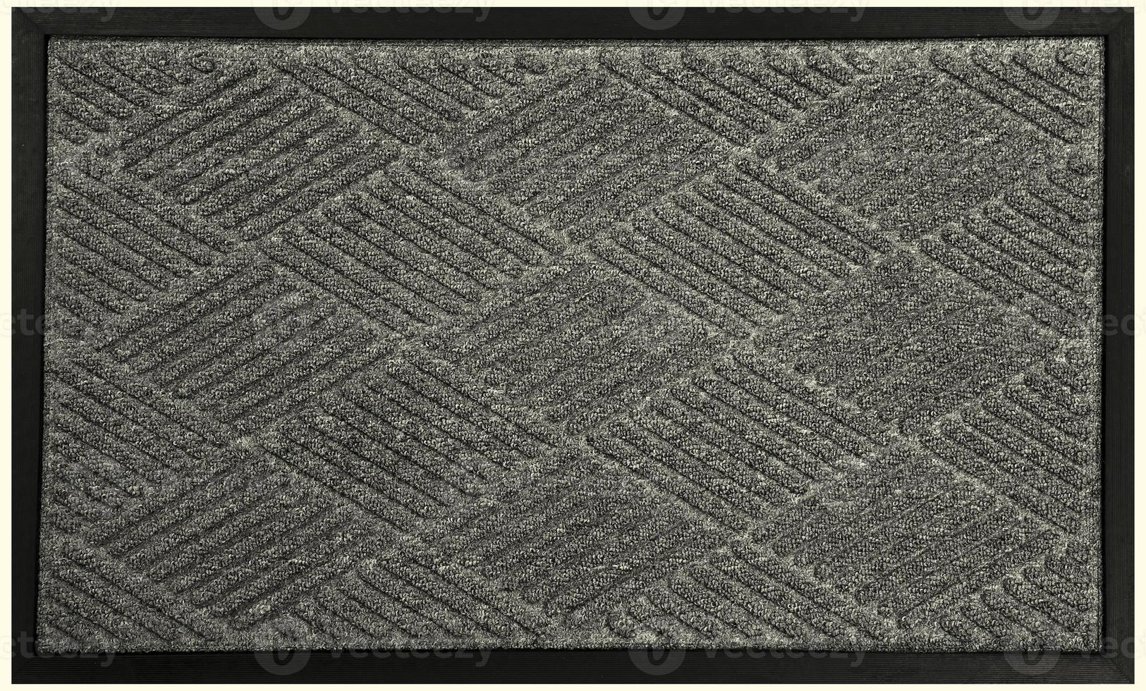 Black grey zig zag pattern rubber and woolen doormat photo