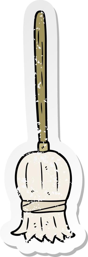 distressed sticker of a cartoon broom vector