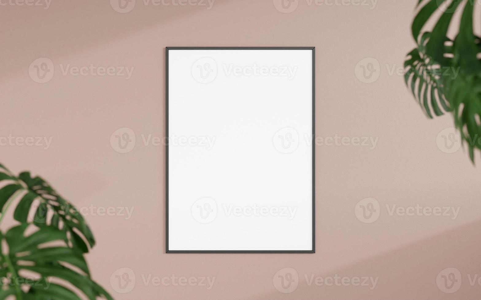 Clean and minimalist front view vertical black photo or poster frame mockup hanging on the wall with blurry plant. 3d rendering.