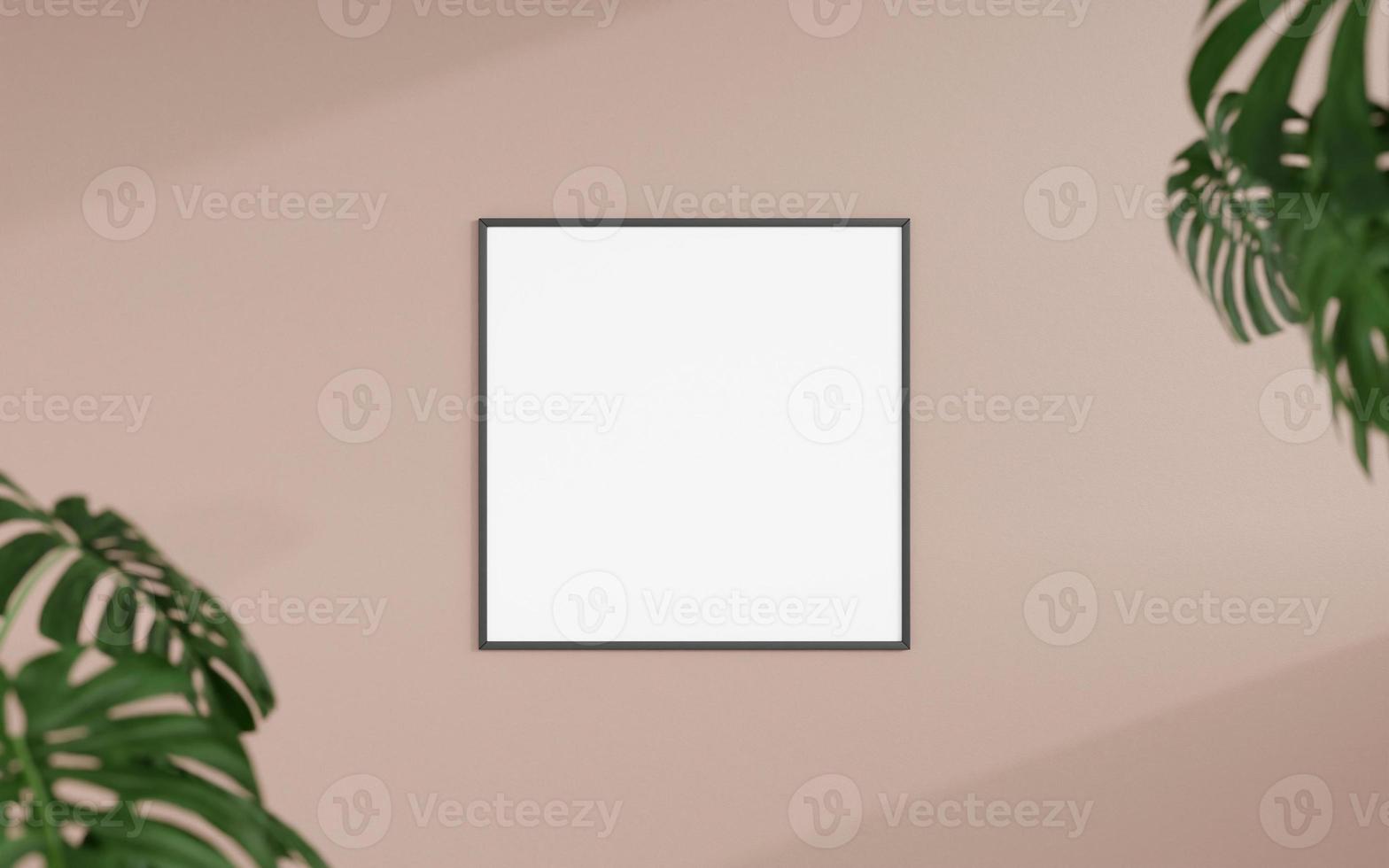 Clean and minimalist front view square black photo or poster frame mockup hanging on the wall with blurry plant. 3d rendering.