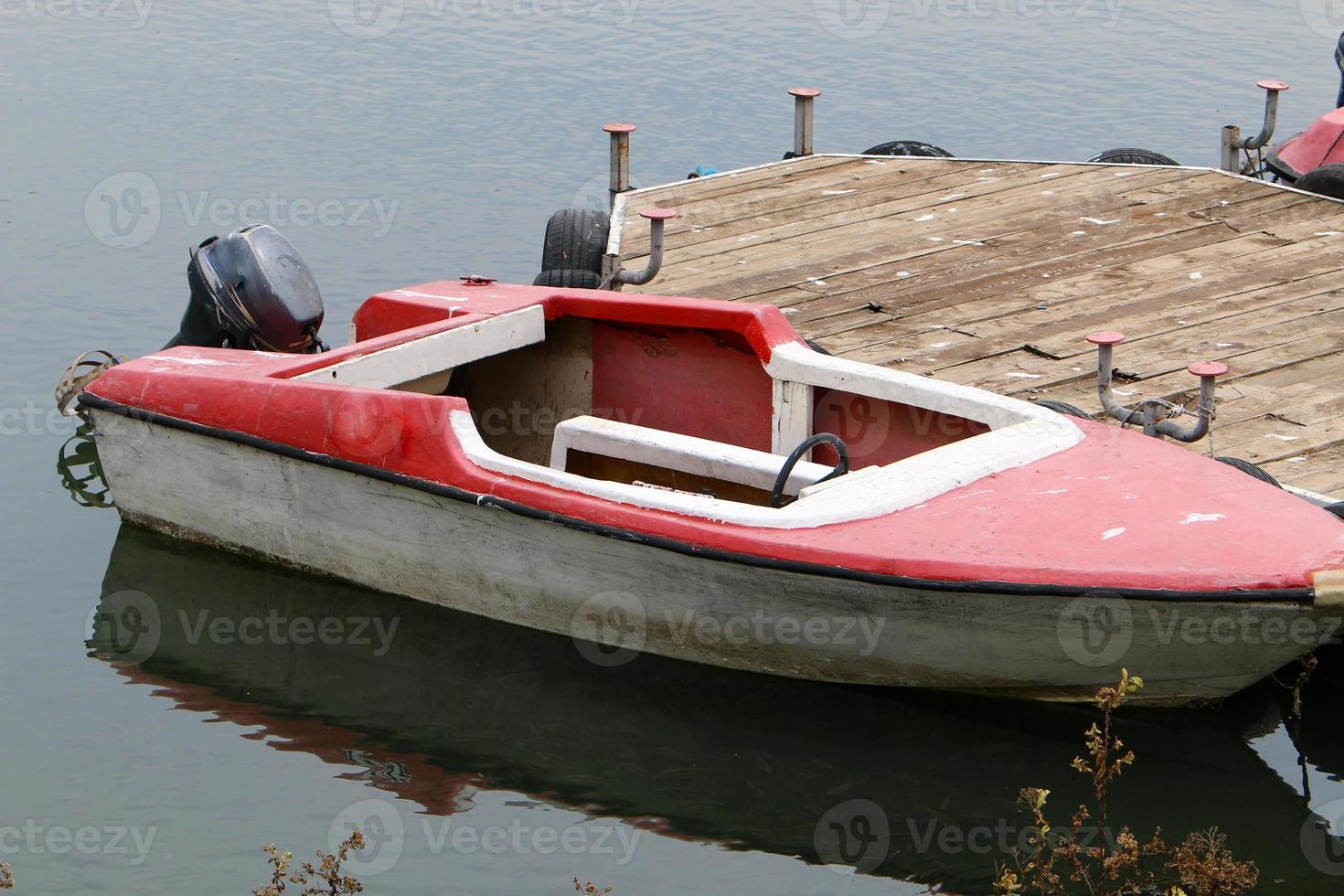 Berth for mooring boats and yachts on the seashore. photo