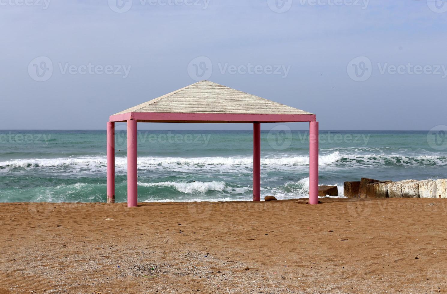 Canopy from the scorching sun on the seashore. photo