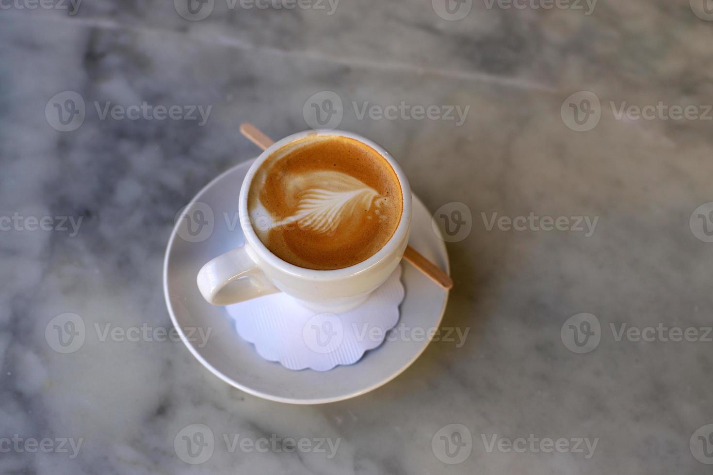 On the table in the restaurant strong and hot coffee. photo