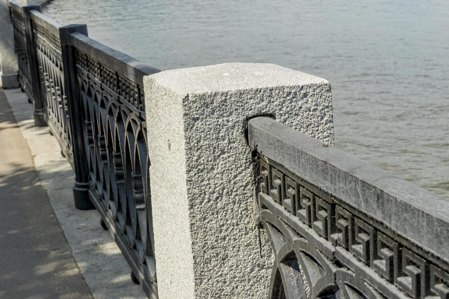 metal fence of riverside photo