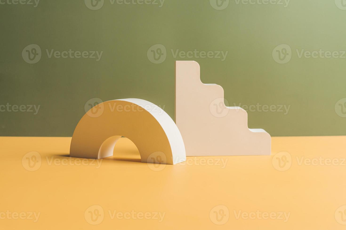 Set of gypsum and clay geometrical shapes on double pastel background. Trendy poster for design. photo