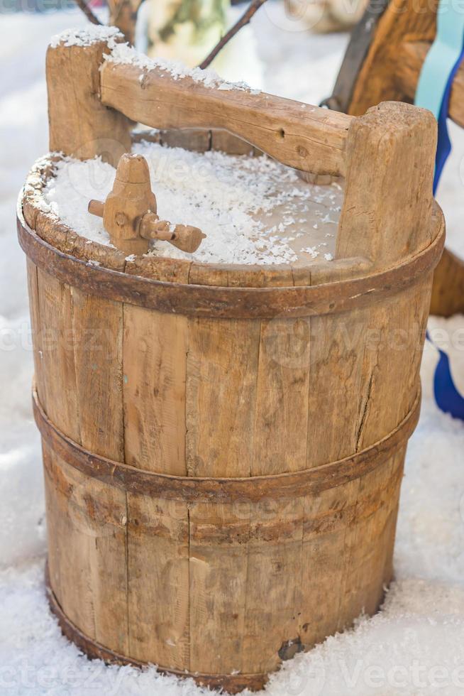 wooden barrel on artificial snow photo