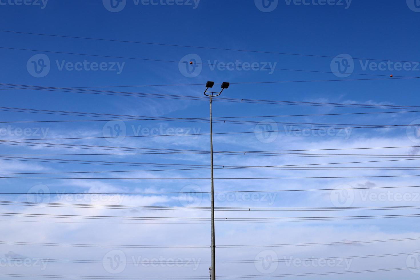 Electrical wires carrying high voltage current. photo