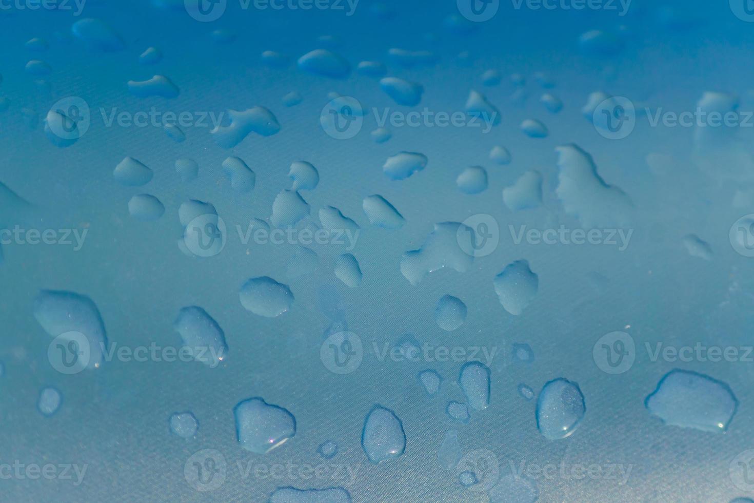 close up of water drops on Inflatable pool, background texture photo