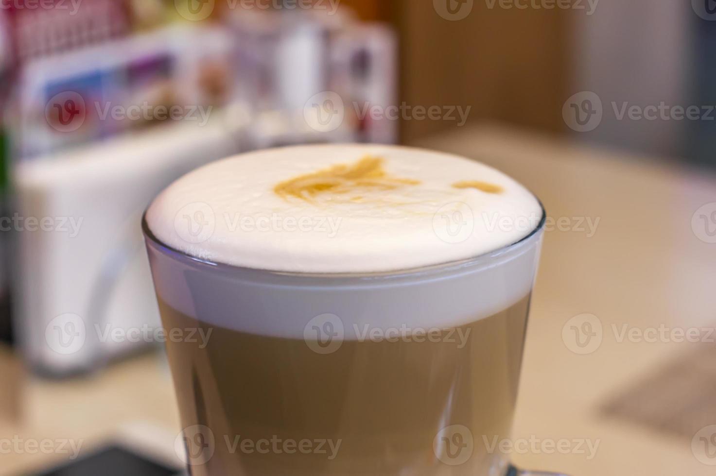Coffee Latte in a glass cup photo