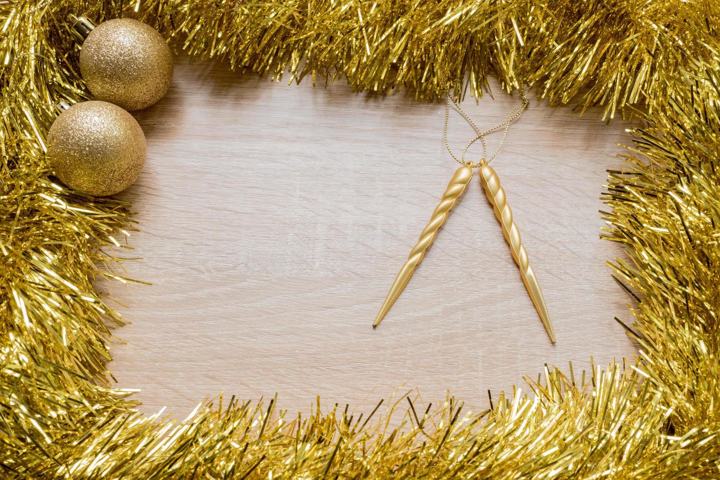 Christmas New Year holiday background. Golden tinsel. Copy space photo