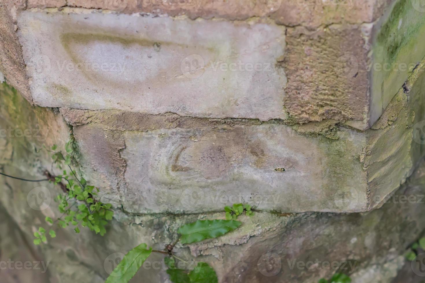 closeup of grunge stone wall photo