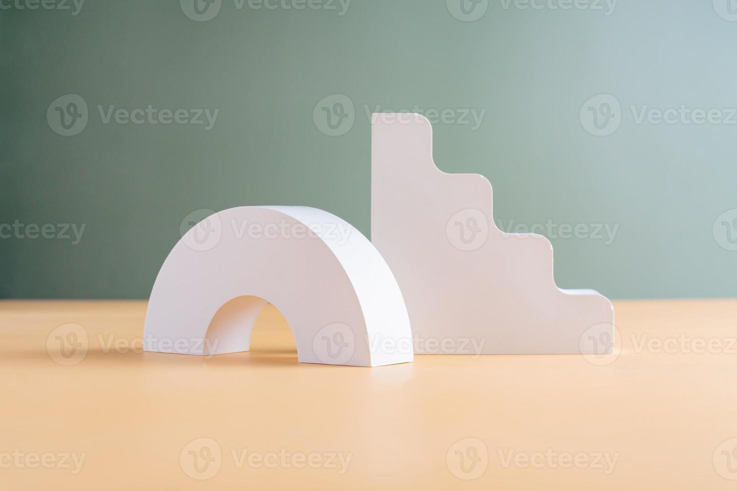 White concrete advertising stands with shadow. Gypsum podium for the presentation of cosmetic products photo