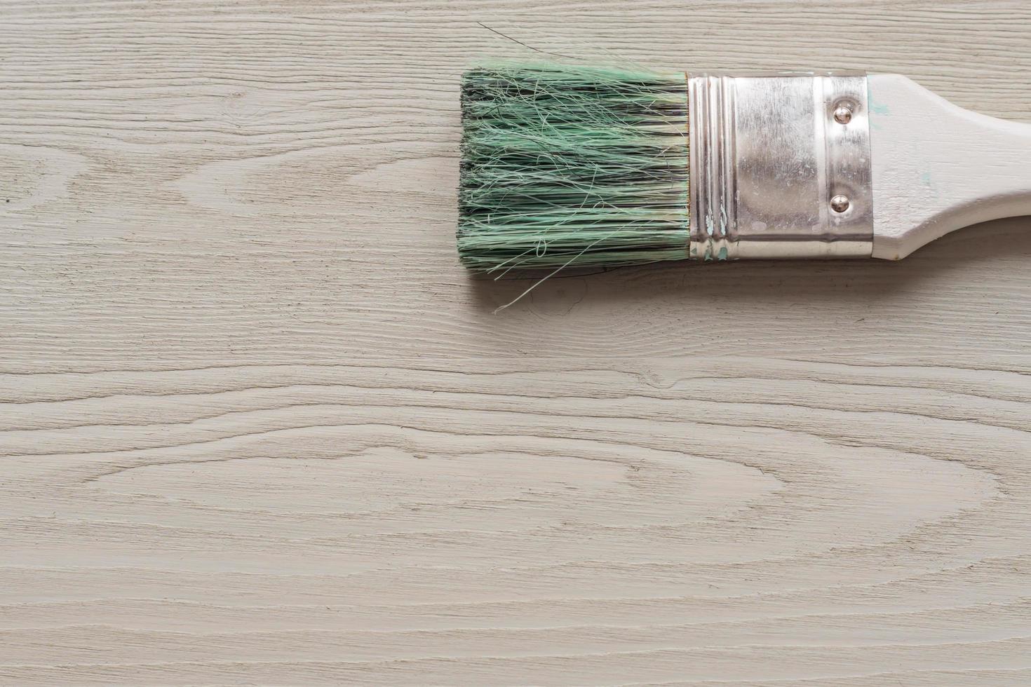 painted wooden desk and brush photo