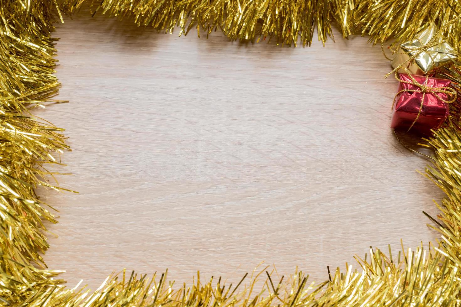 Christmas New Year holiday background. Golden tinsel. Copy space photo