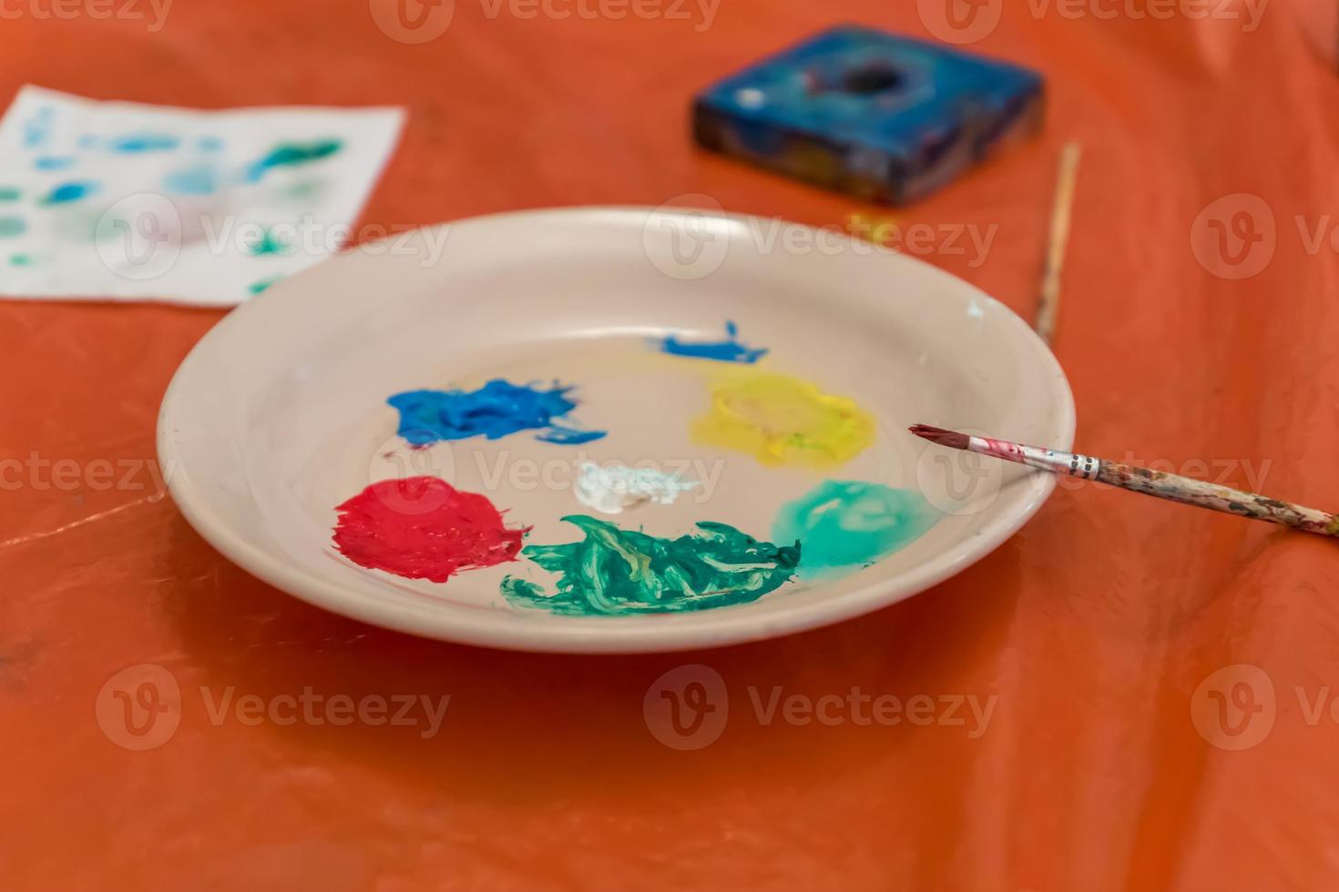 plate with acrylic paint for decoration photo