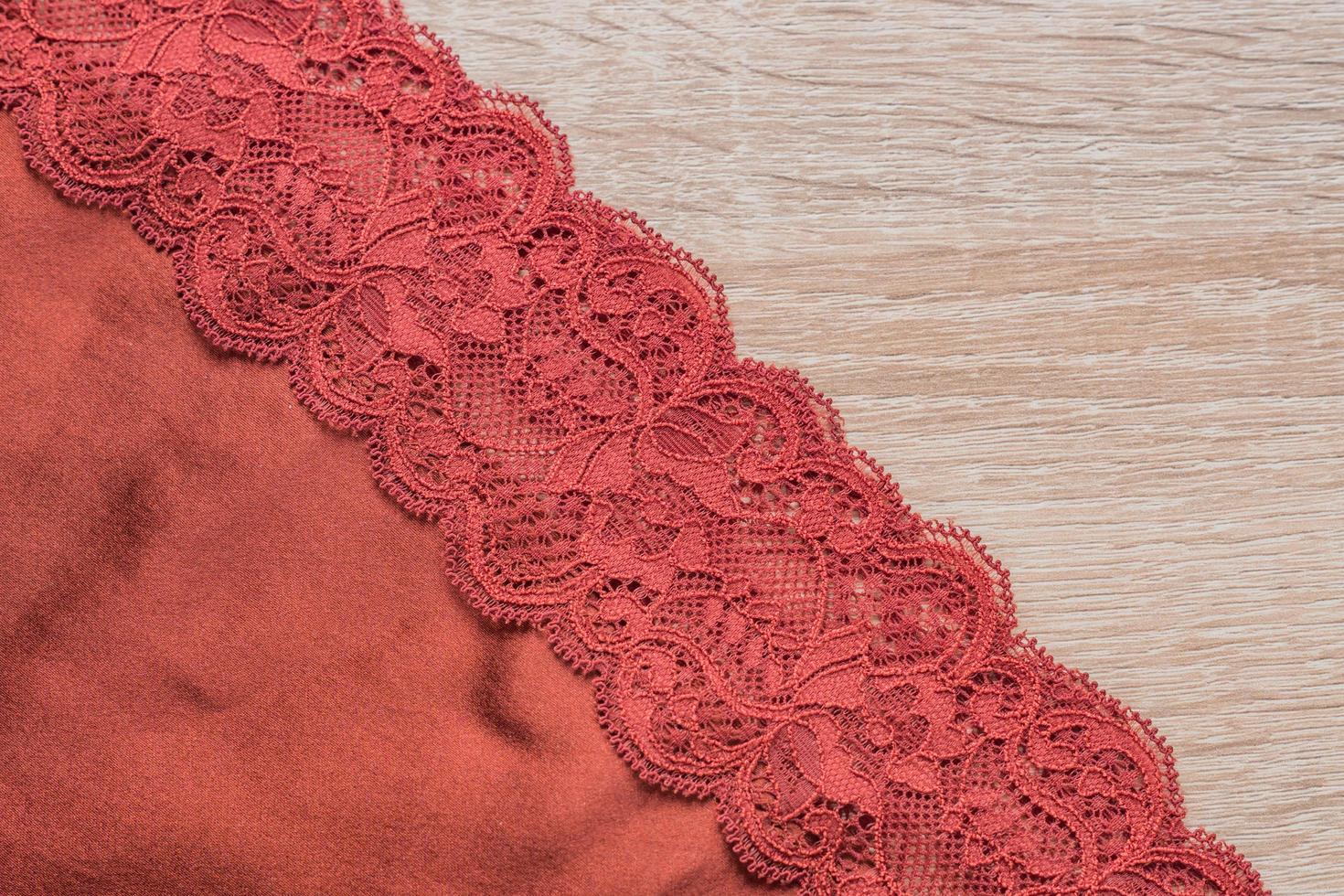 silk and lace on wooden background photo