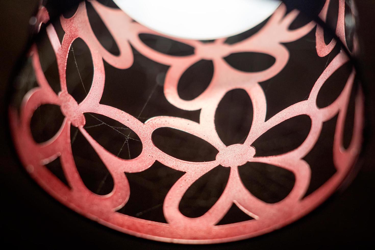 closeup of lamp with spiderweb photo