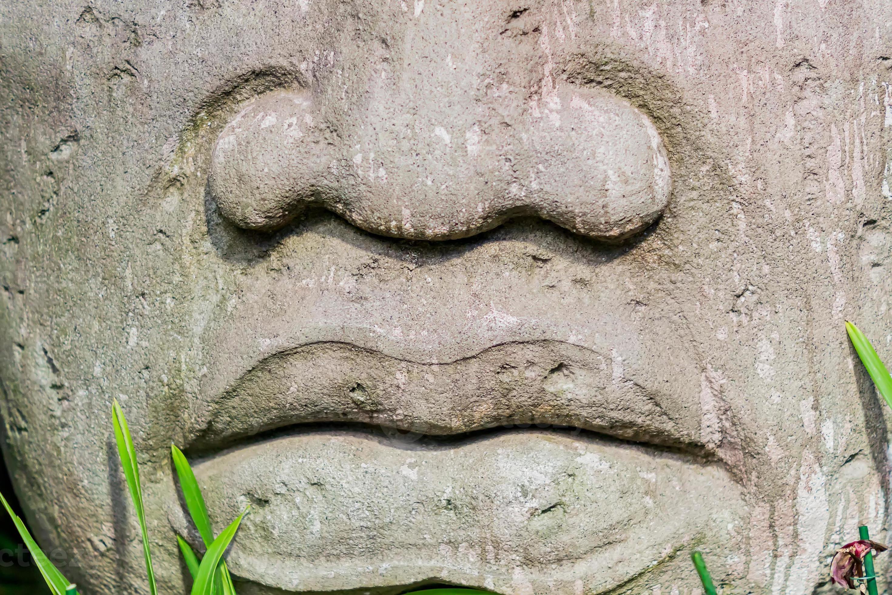 closeup of a Big head statue made of stone 9984863 Stock Photo at Vecteezy