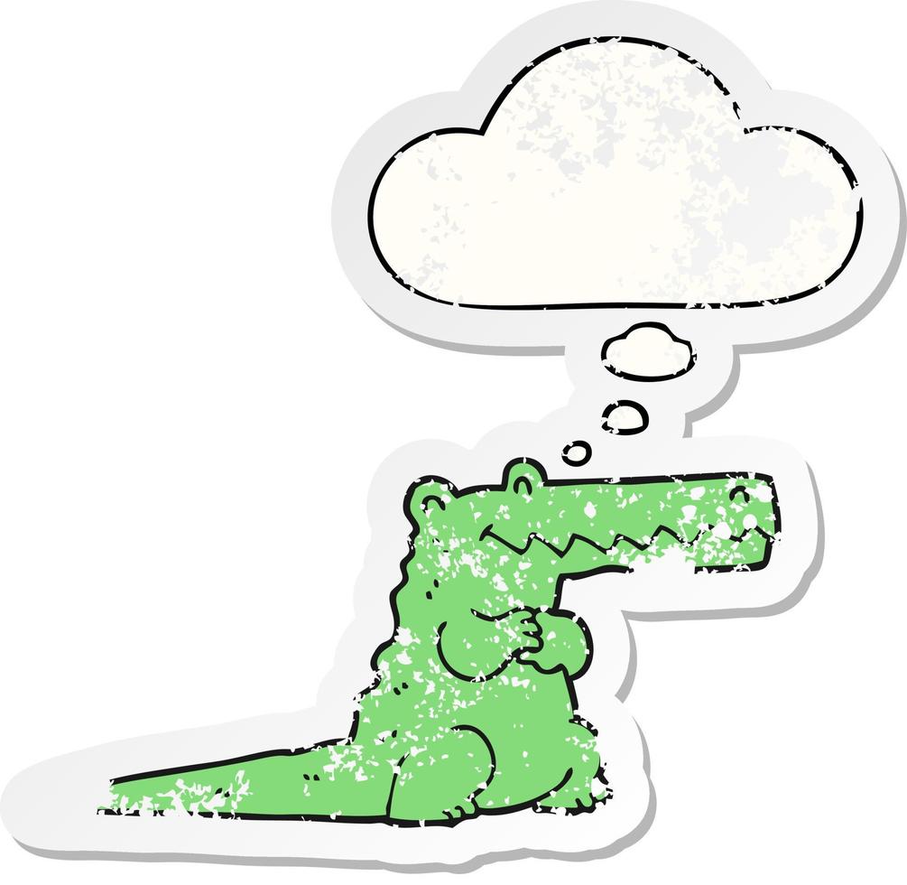 cartoon crocodile and thought bubble as a distressed worn sticker vector