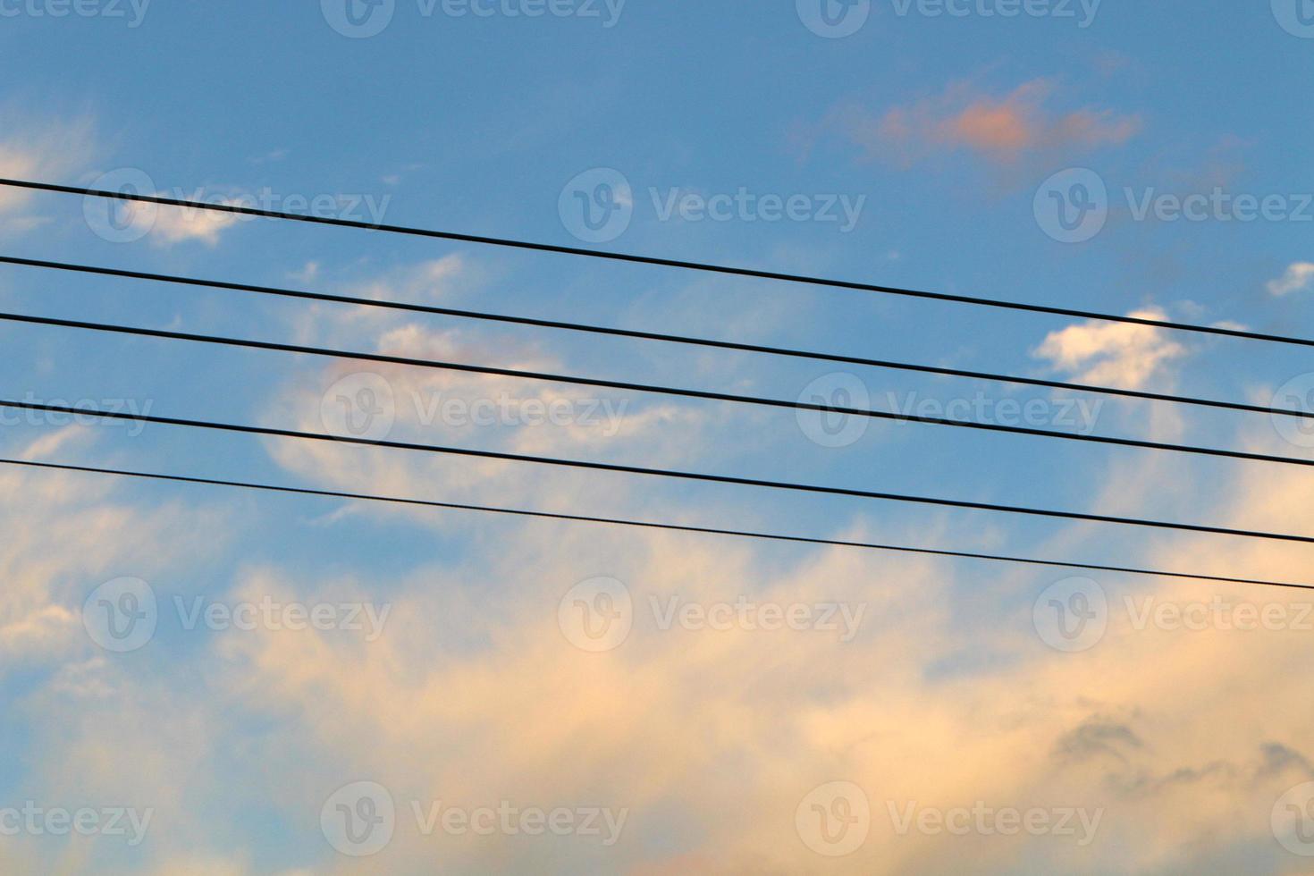 Electrical wires carrying high voltage current. photo