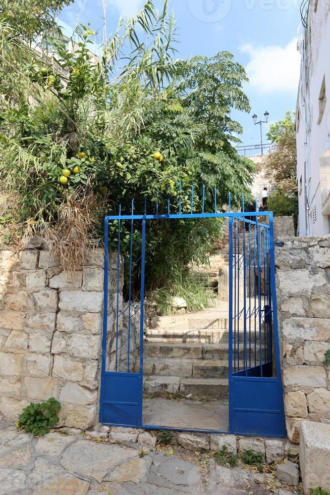 A door is an opening in a wall to enter and exit a building. photo
