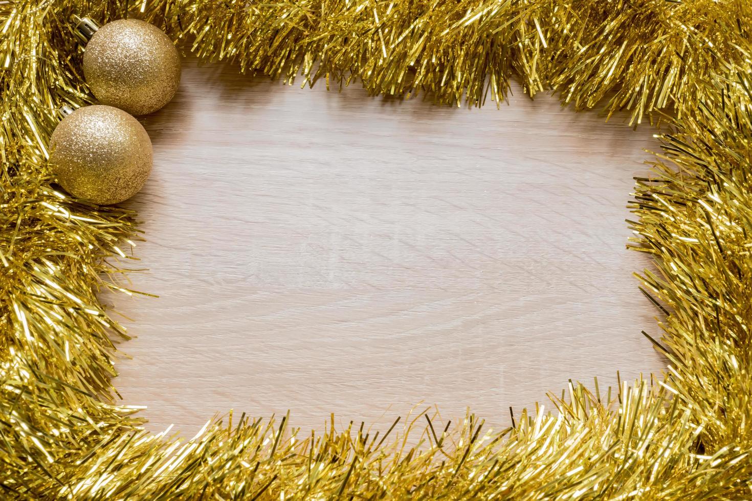 Christmas New Year holiday background. Golden tinsel. Copy space photo