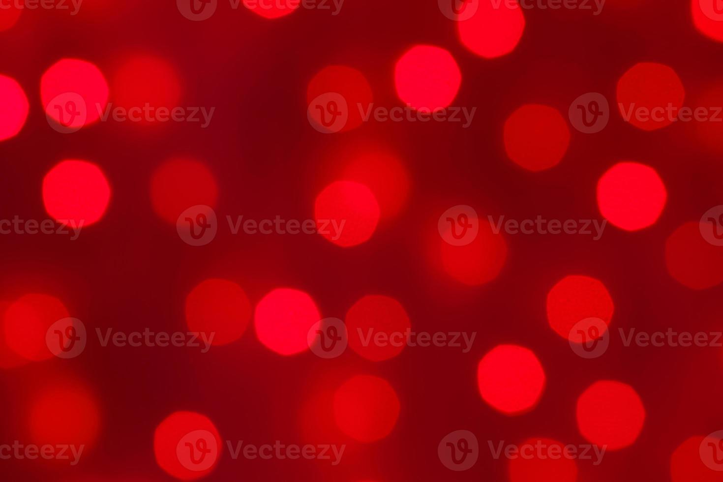 Decorative red LED lights on wires - Defocused gradient background photo