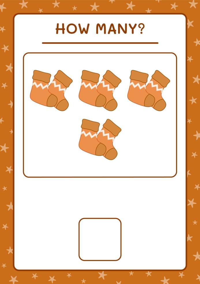 cuantos calcetines navideños, juego para niños. ilustración vectorial, hoja de cálculo imprimible vector