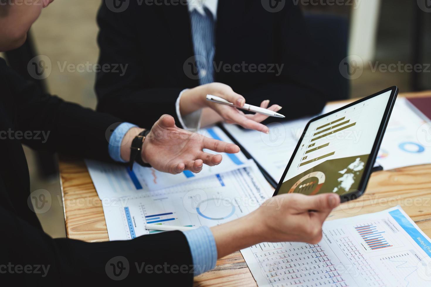 business people working together on a new project to analyze budgets and manage investment risks in today's profit boosting for marketing in the office room photo