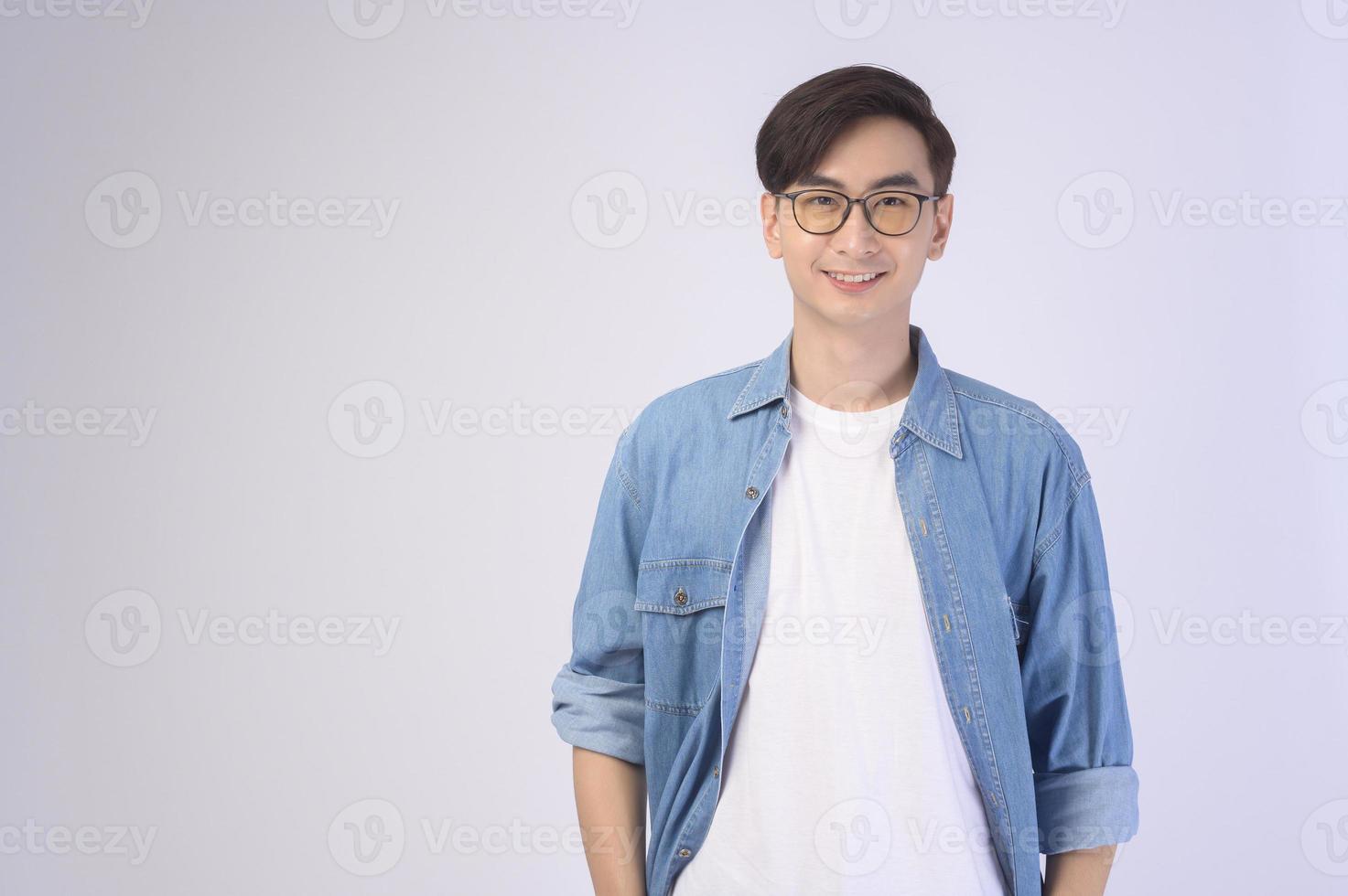 Portrait of asian man wearing glasses over white background studio, eyecare concept. photo