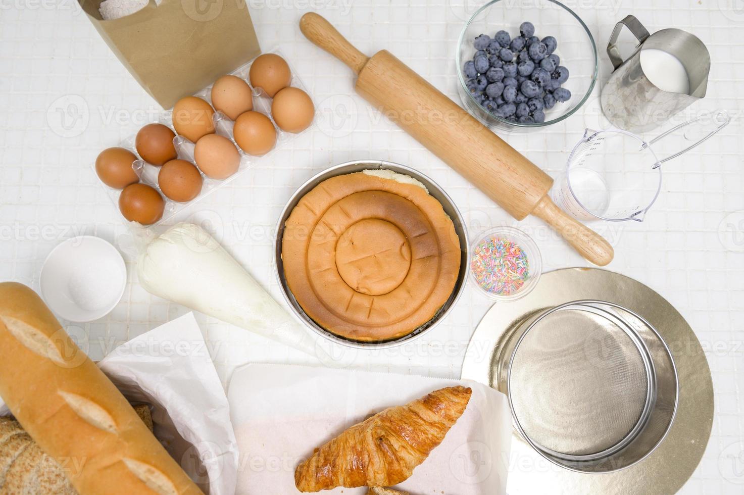 Baking or cooking ingredients composition on the kitchen table  background, coffee shop business concept photo