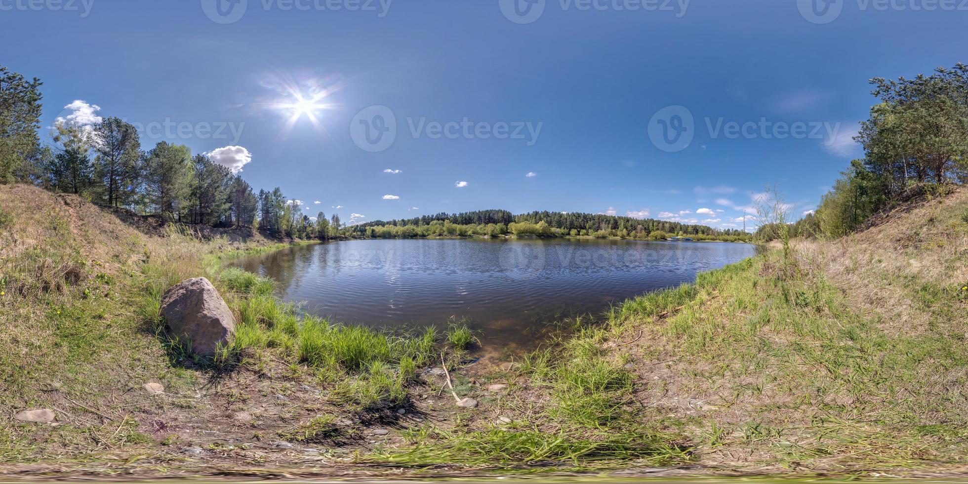 seamless spherical hdri panorama 360 degrees angle view on grass coast of huge river or lake in sunny summer day and windy weather in equirectangular projection with zenith and nadir, VR AR content photo