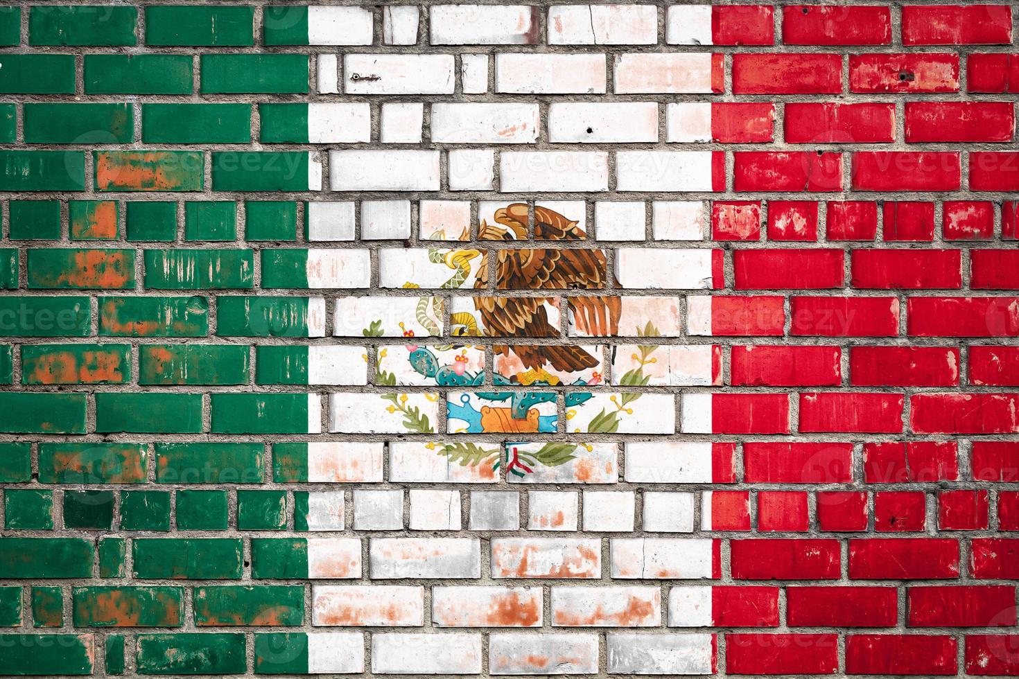 National  flag of the  Mexico   on a grunge brick background. photo