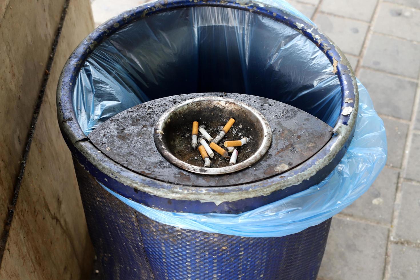 Ashtray - a place for tobacco ash and cigarette butts photo