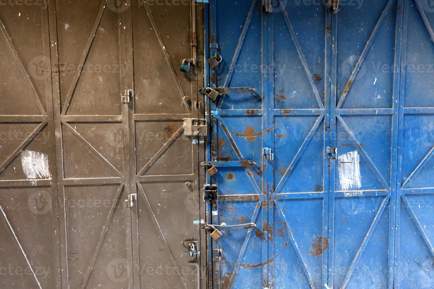 A door is an opening in a wall to enter and exit a building. photo
