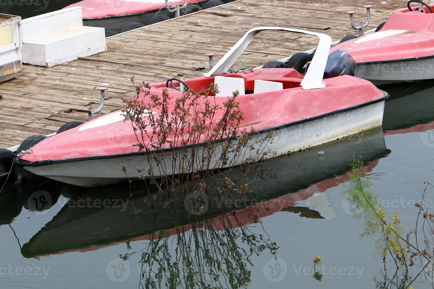 Berth for mooring boats and yachts on the seashore. photo