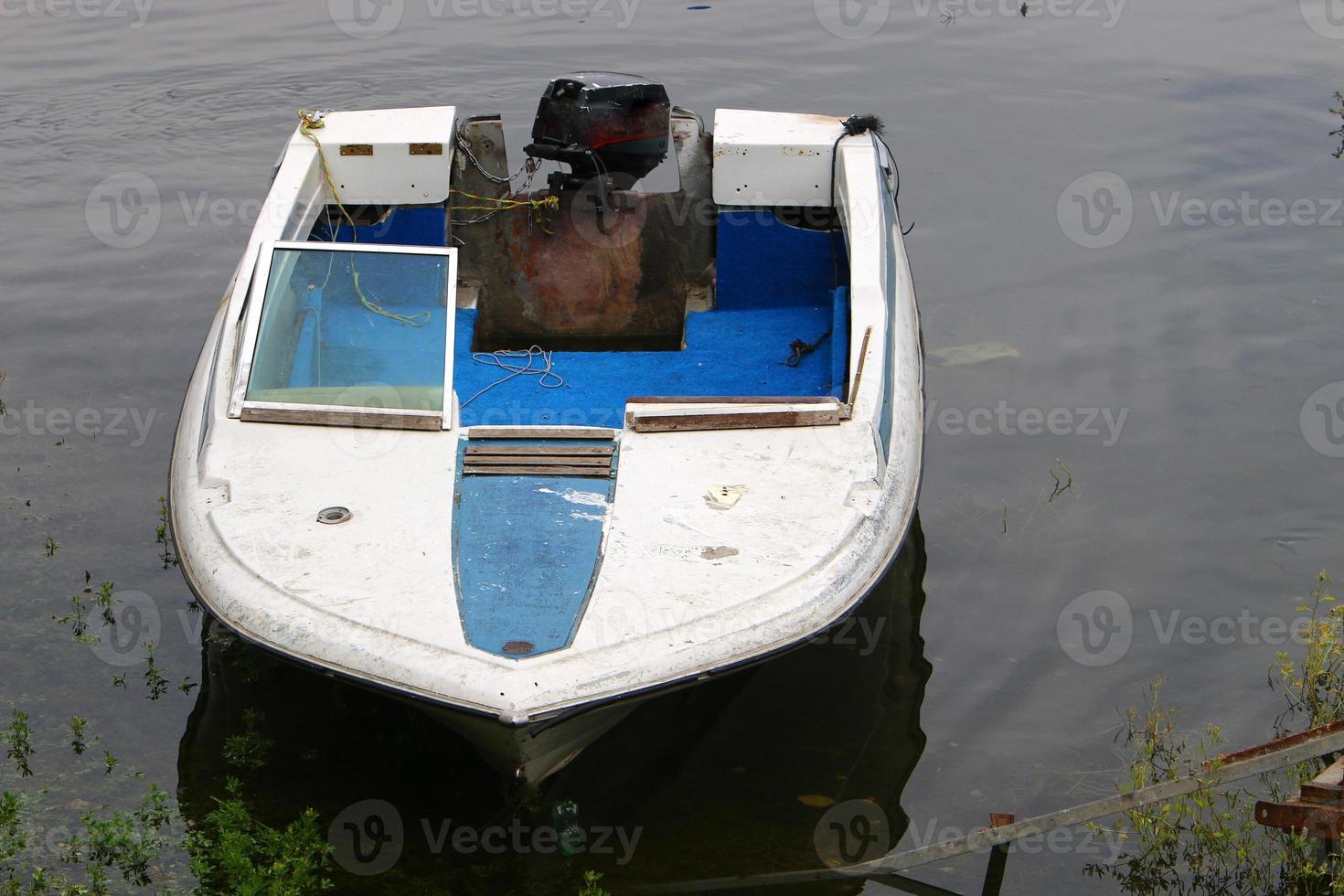 Berth for mooring boats and yachts on the seashore. photo