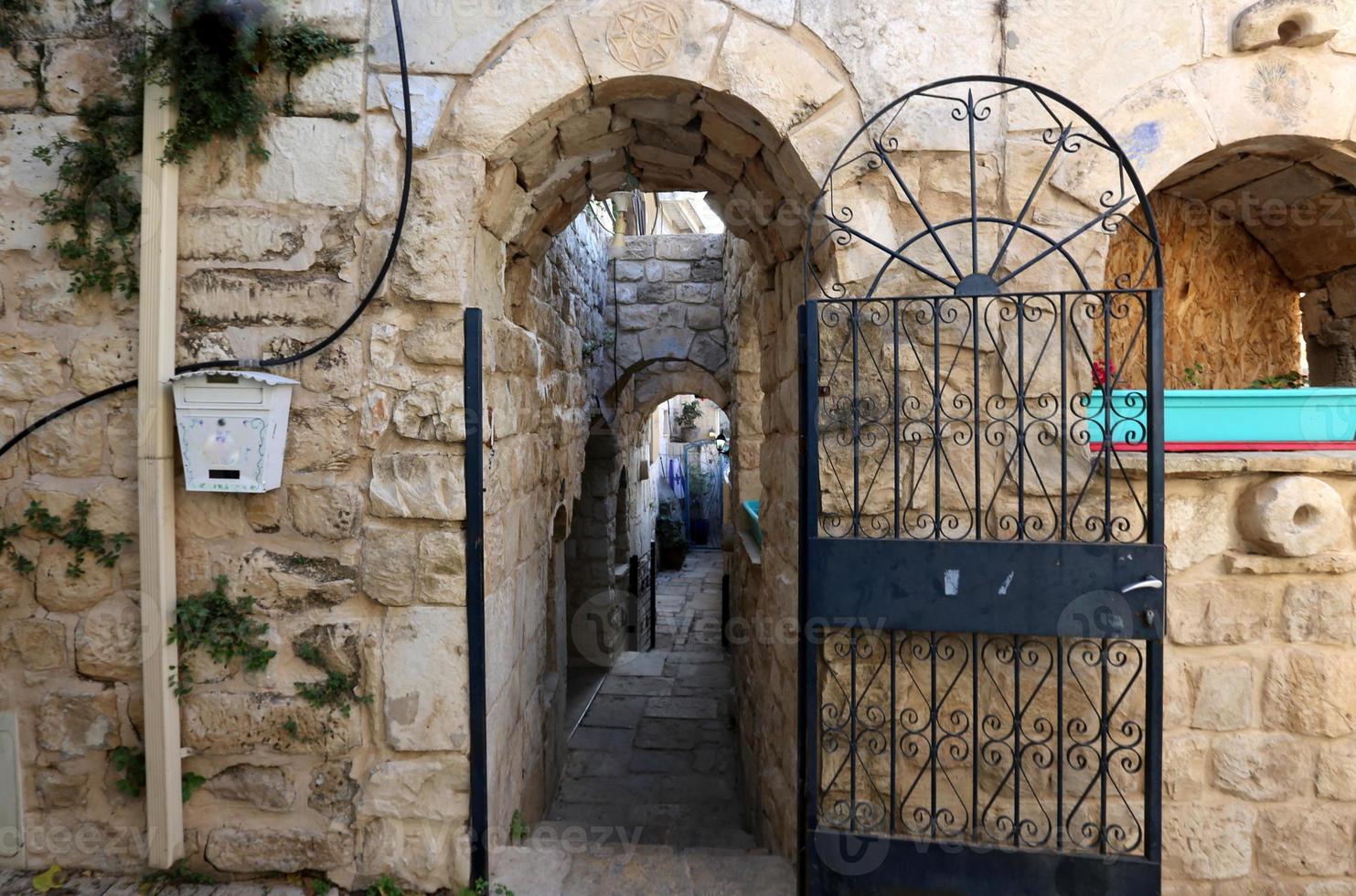 A door is an opening in a wall to enter and exit a building. photo