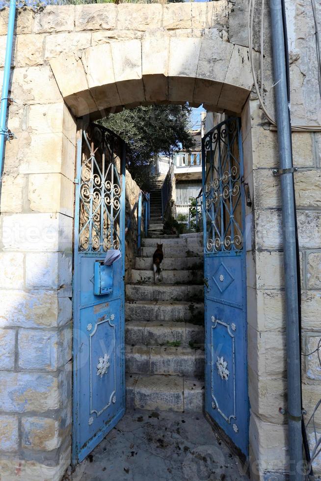 A door is an opening in a wall to enter and exit a building. photo