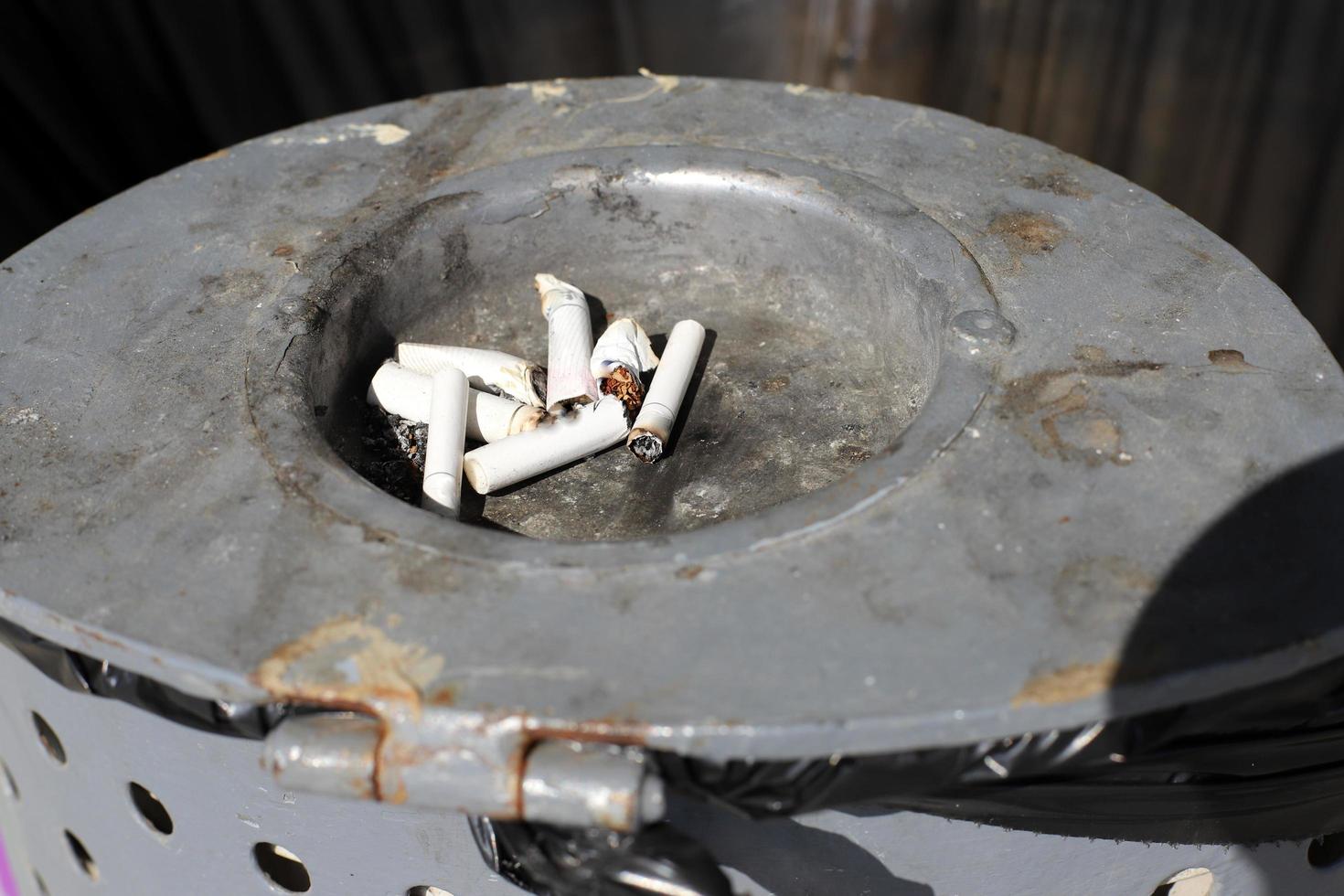 Ashtray - a place for tobacco ash and cigarette butts photo