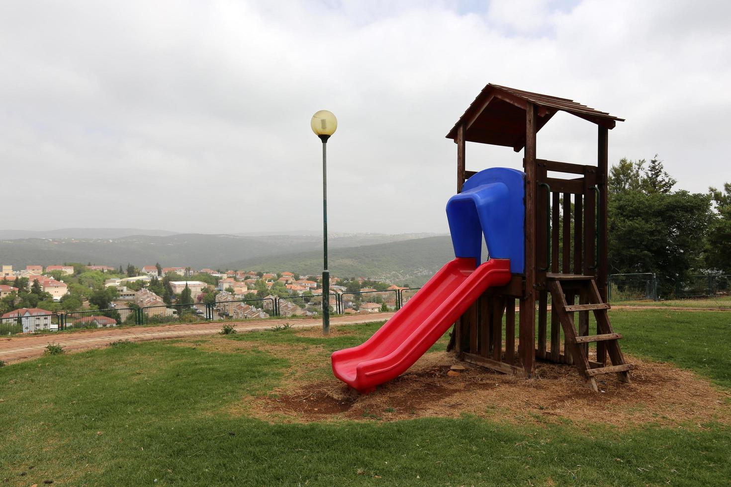 Toys and sports equipment on a playground in Israel. photo