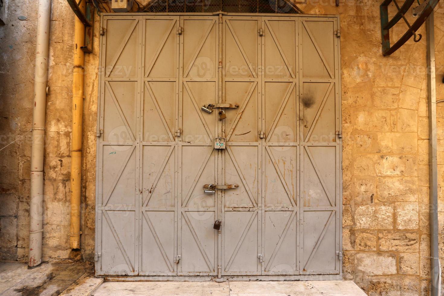 A door is an opening in a wall to enter and exit a building. photo