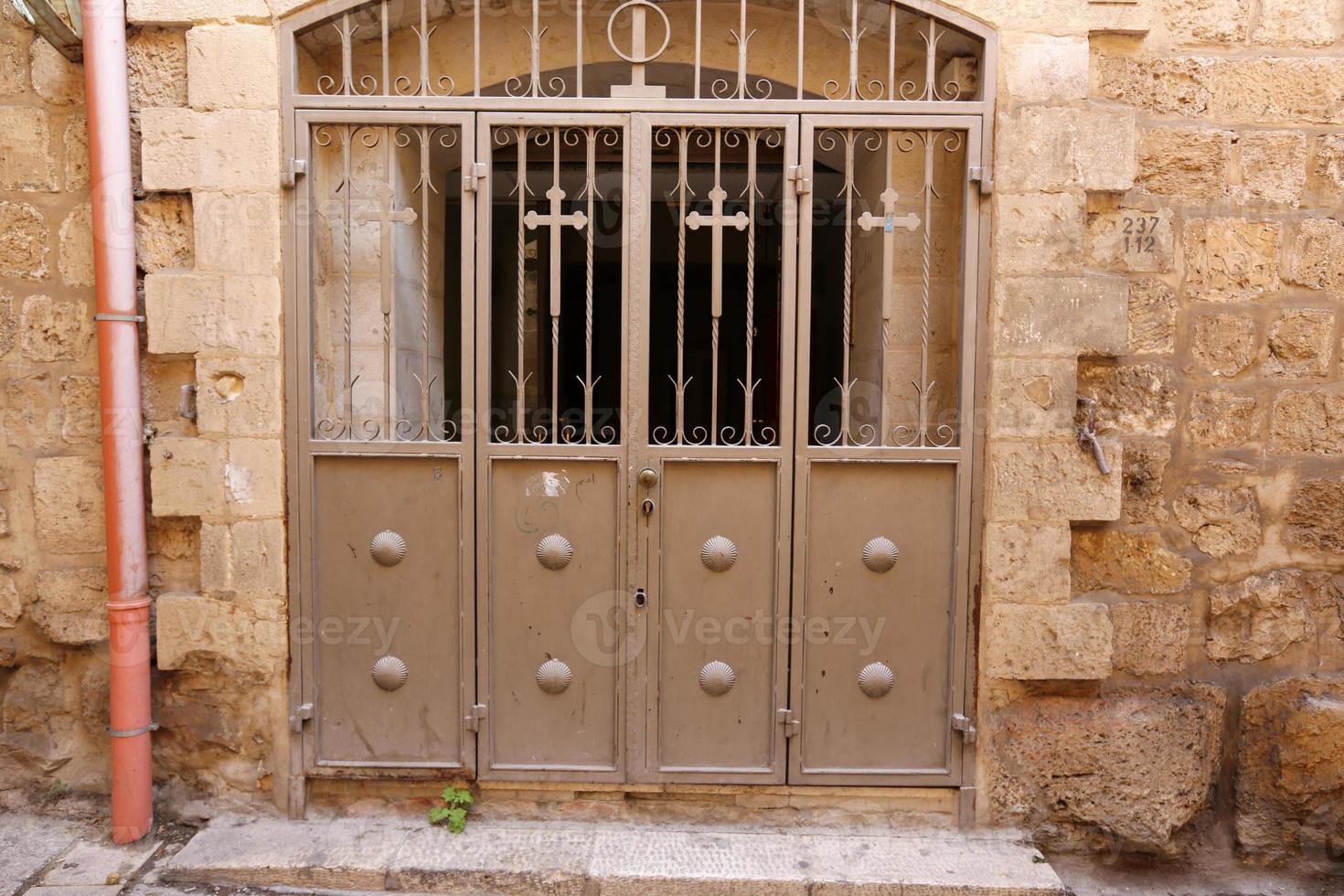 A door is an opening in a wall to enter and exit a building. photo