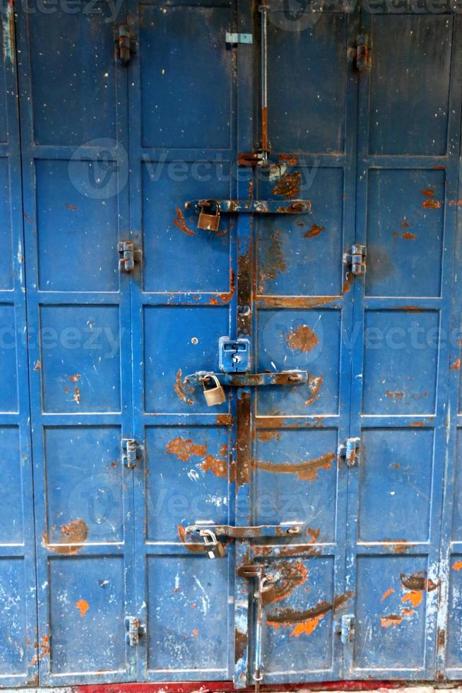 A door is an opening in a wall to enter and exit a building. photo