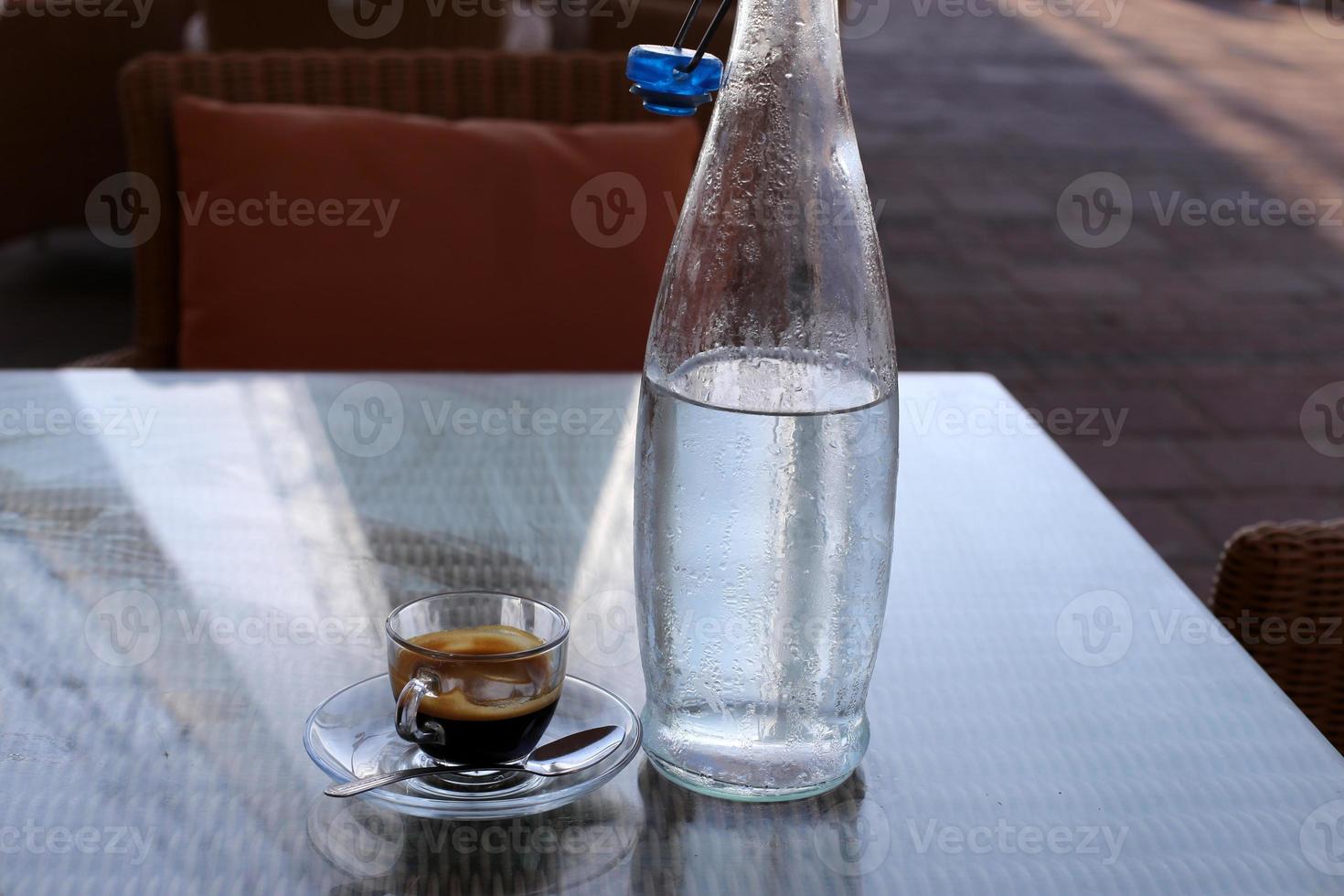 On the table in the restaurant strong and hot coffee. photo