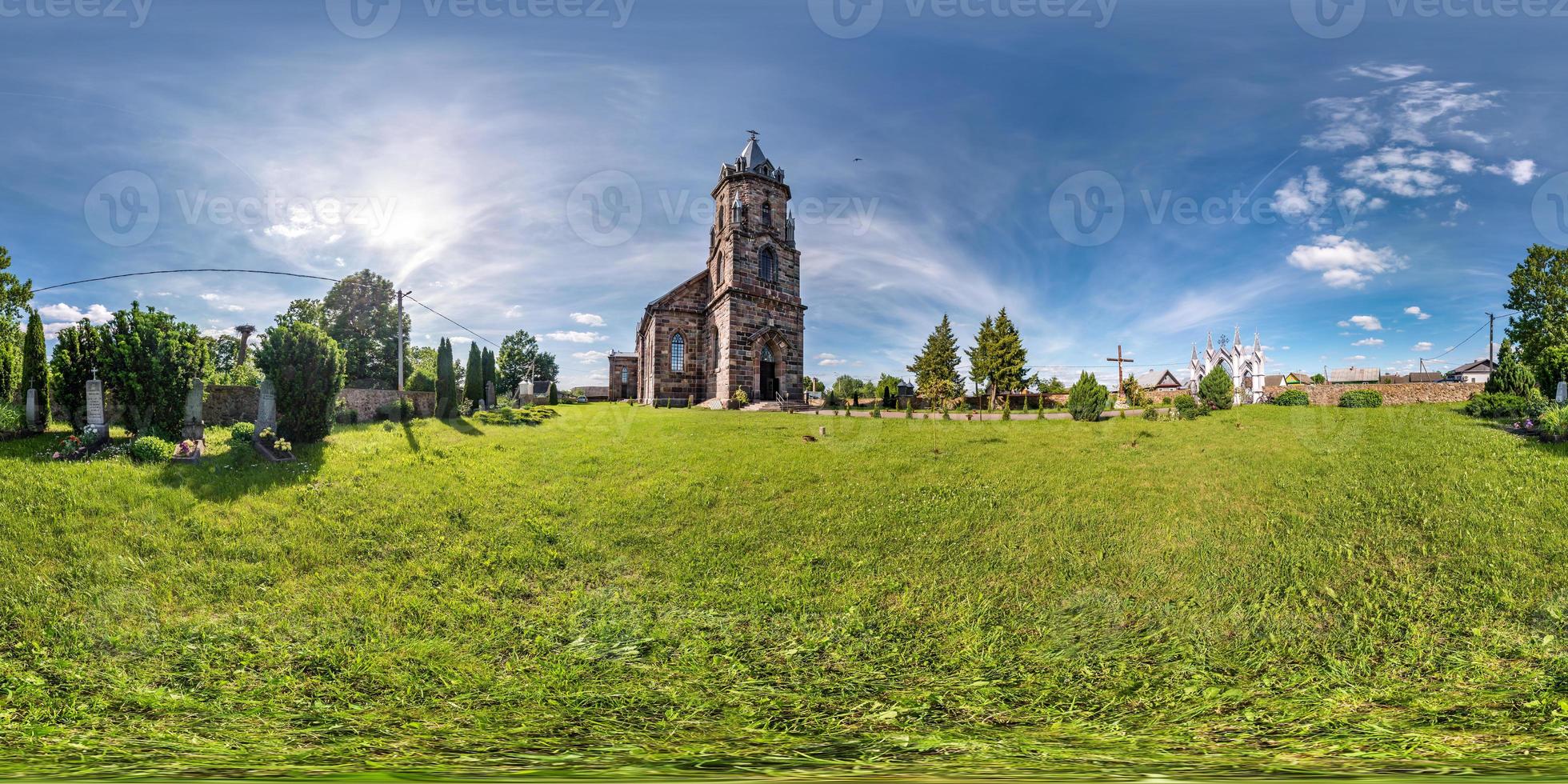 Full seamless hdri panorama 360 degrees angle view facade of church in beautiful decorative medieval neo gothic style architecture in small village in equirectangular spherical projection. vr content photo